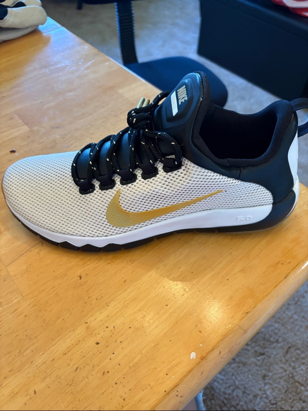 Nike Men’s White, Black and Gold Mesh Athletic Sneakers